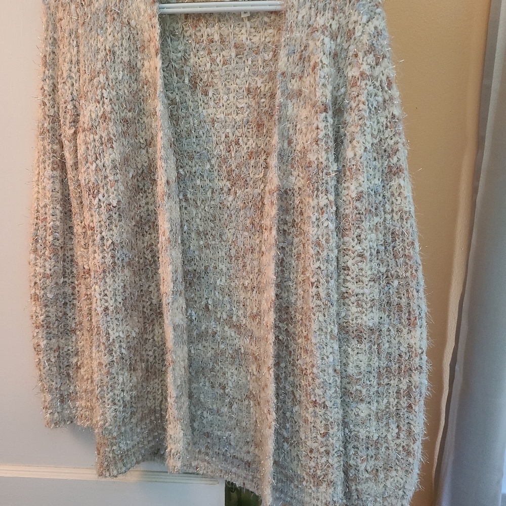 Long sleeve sweater. Worn once. Great condition. Smoke free